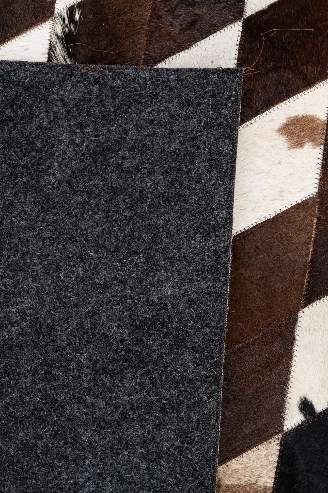 4' x 5' 11 Cowhide Stocks Rug