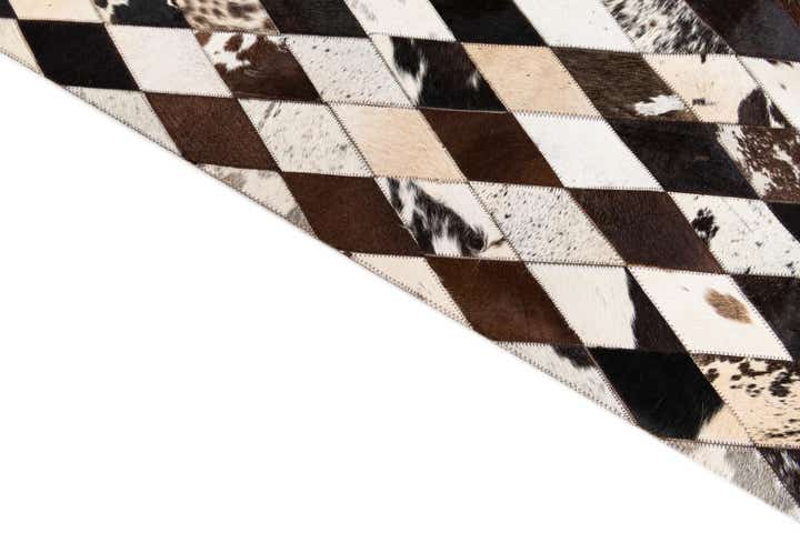 4' 1 x 5' 10 Cowhide Stocks Rug