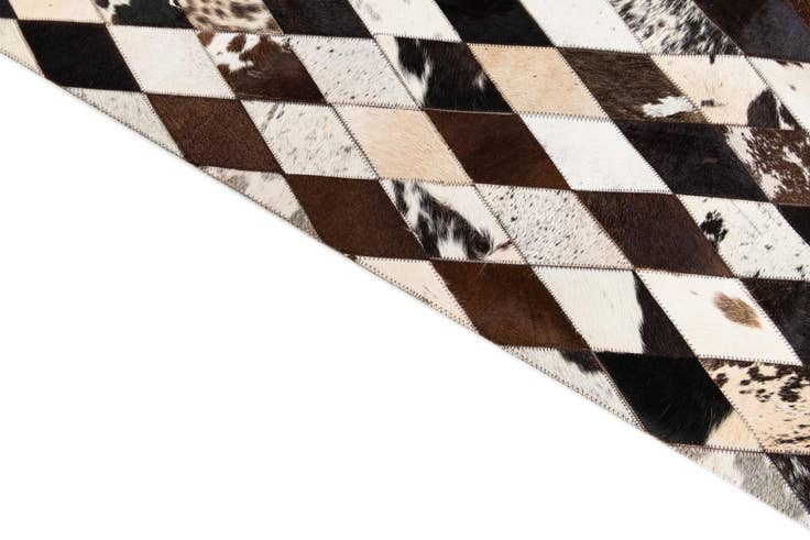 Detail image of 4' 1 x 5' 10 Cowhide Stocks Rug