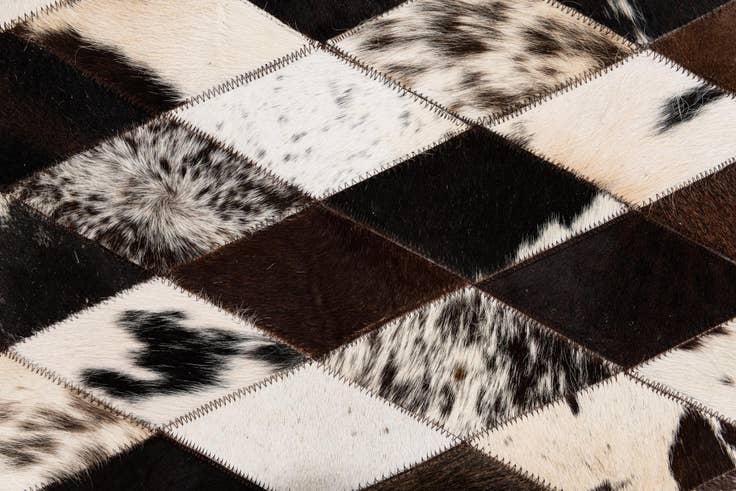 Detail image of 4' 1 x 5' 10 Cowhide Stocks Rug