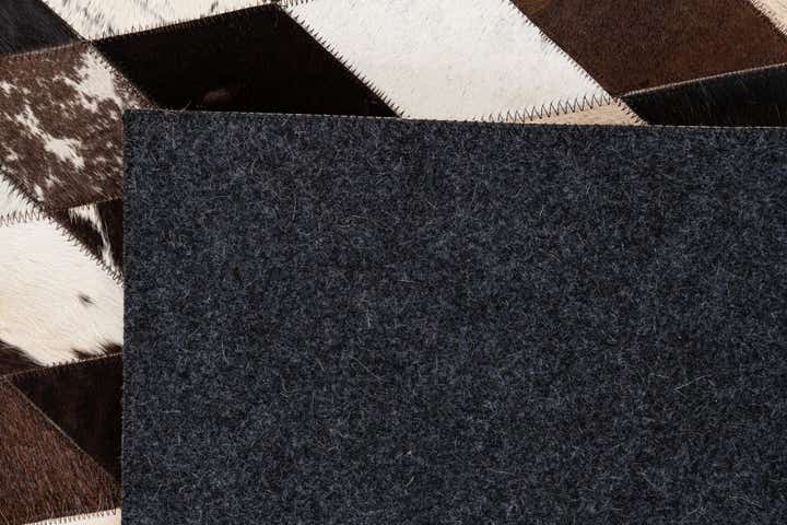 4' 1 x 5' 10 Cowhide Stocks Rug