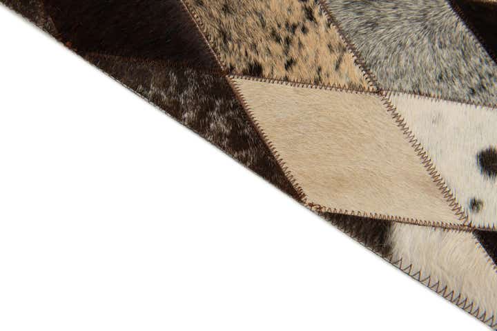 4' 1 x 5' 10 Cowhide Stocks Rug