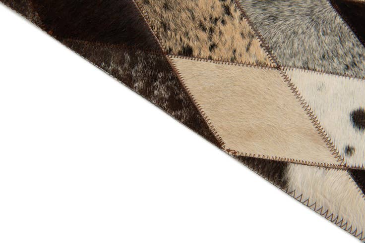 Detail image of 4' 1 x 5' 10 Cowhide Stocks Rug