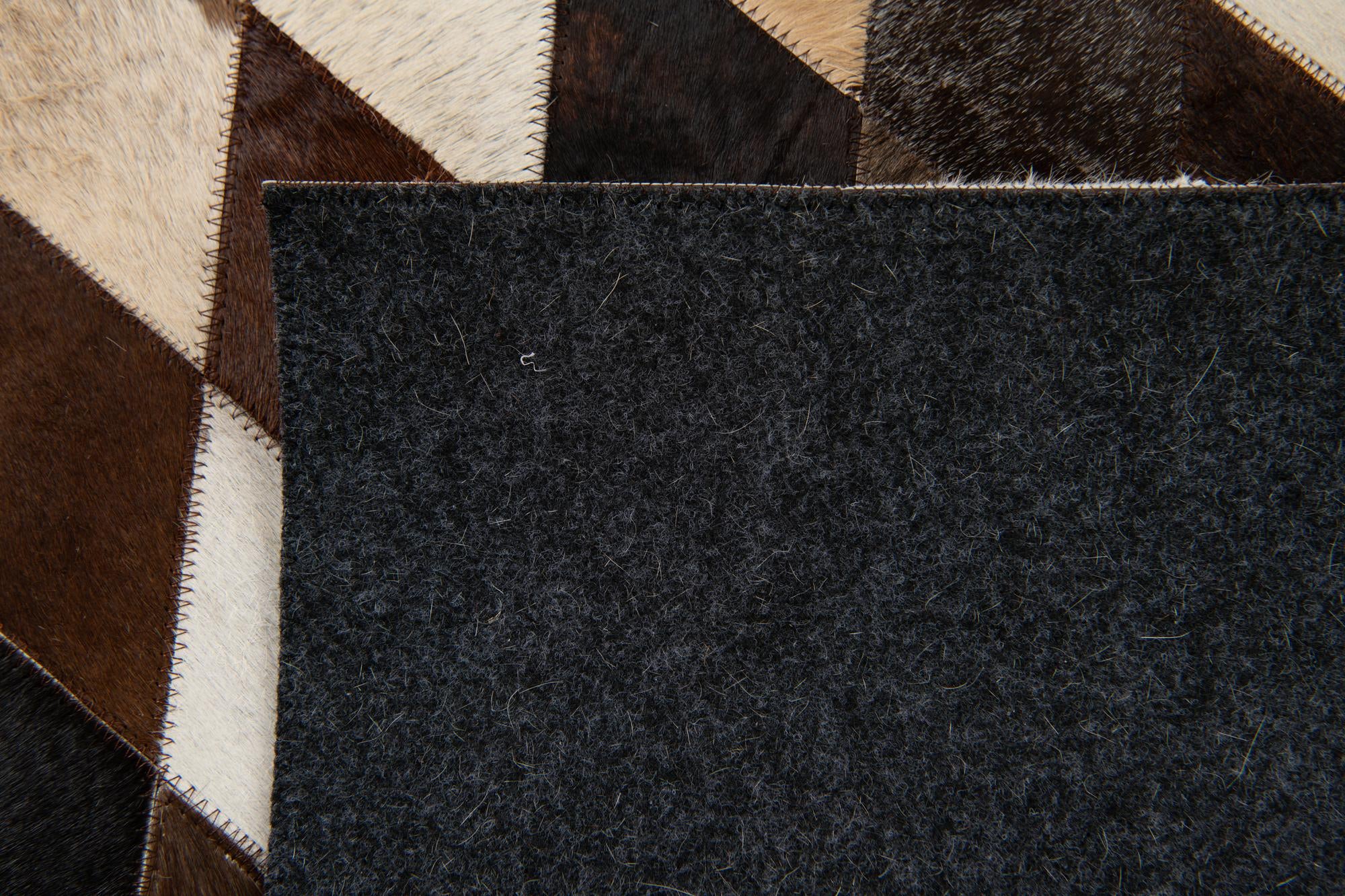 4' 1 x 5' 10 Cowhide Stocks Rug
