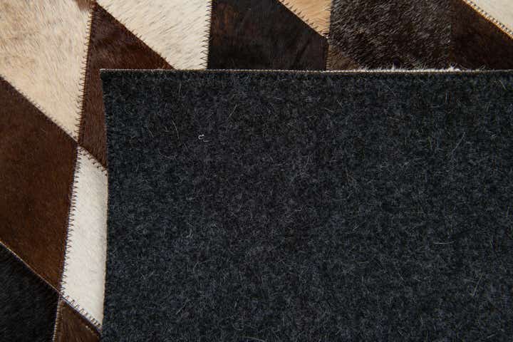 4' 1 x 5' 10 Cowhide Stocks Rug