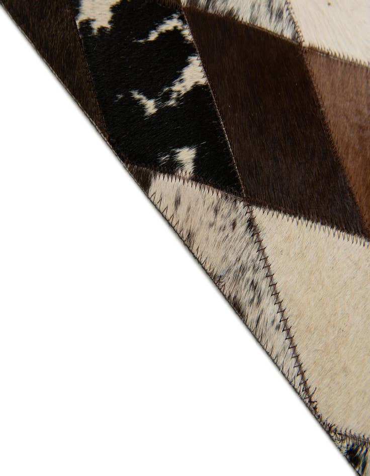 Detail image of 4' 1 x 5' 10 Cowhide Stocks Rug