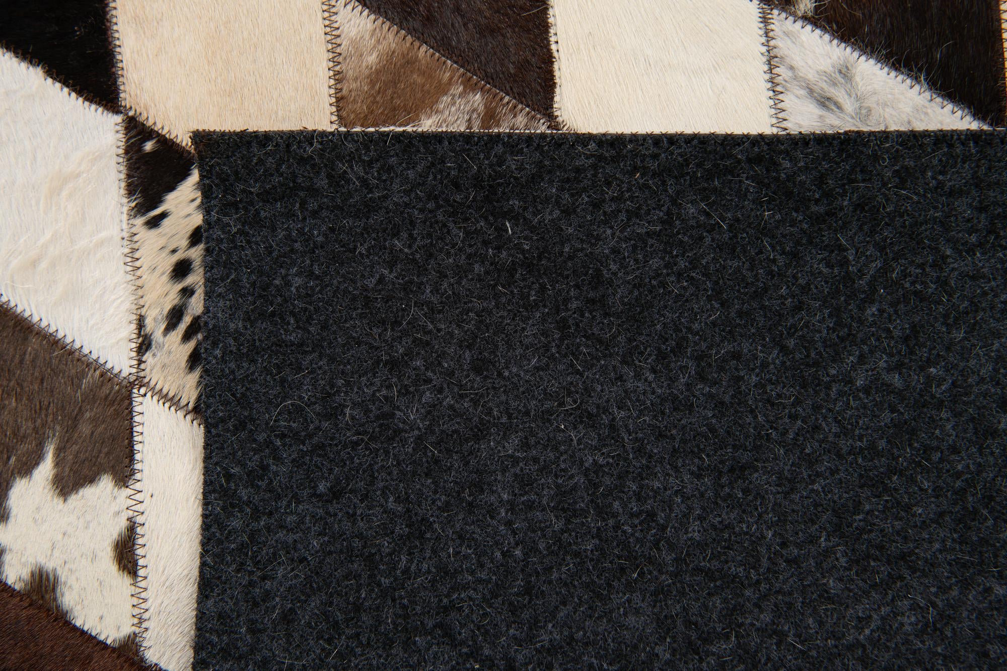 4' 1 x 5' 10 Cowhide Stocks Rug