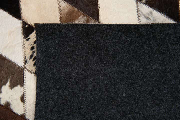 4' 1 x 5' 10 Cowhide Stocks Rug