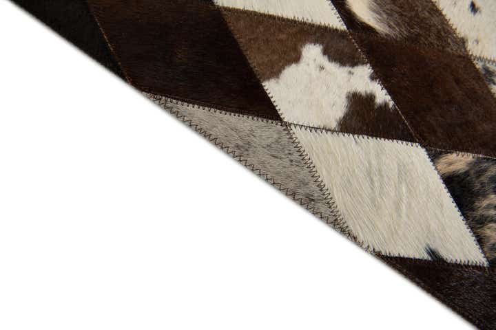 4' 1 x 5' 10 Cowhide Stocks Rug