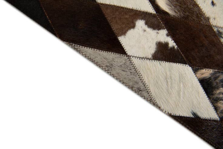 Detail image of 4' 1 x 5' 10 Cowhide Stocks Rug