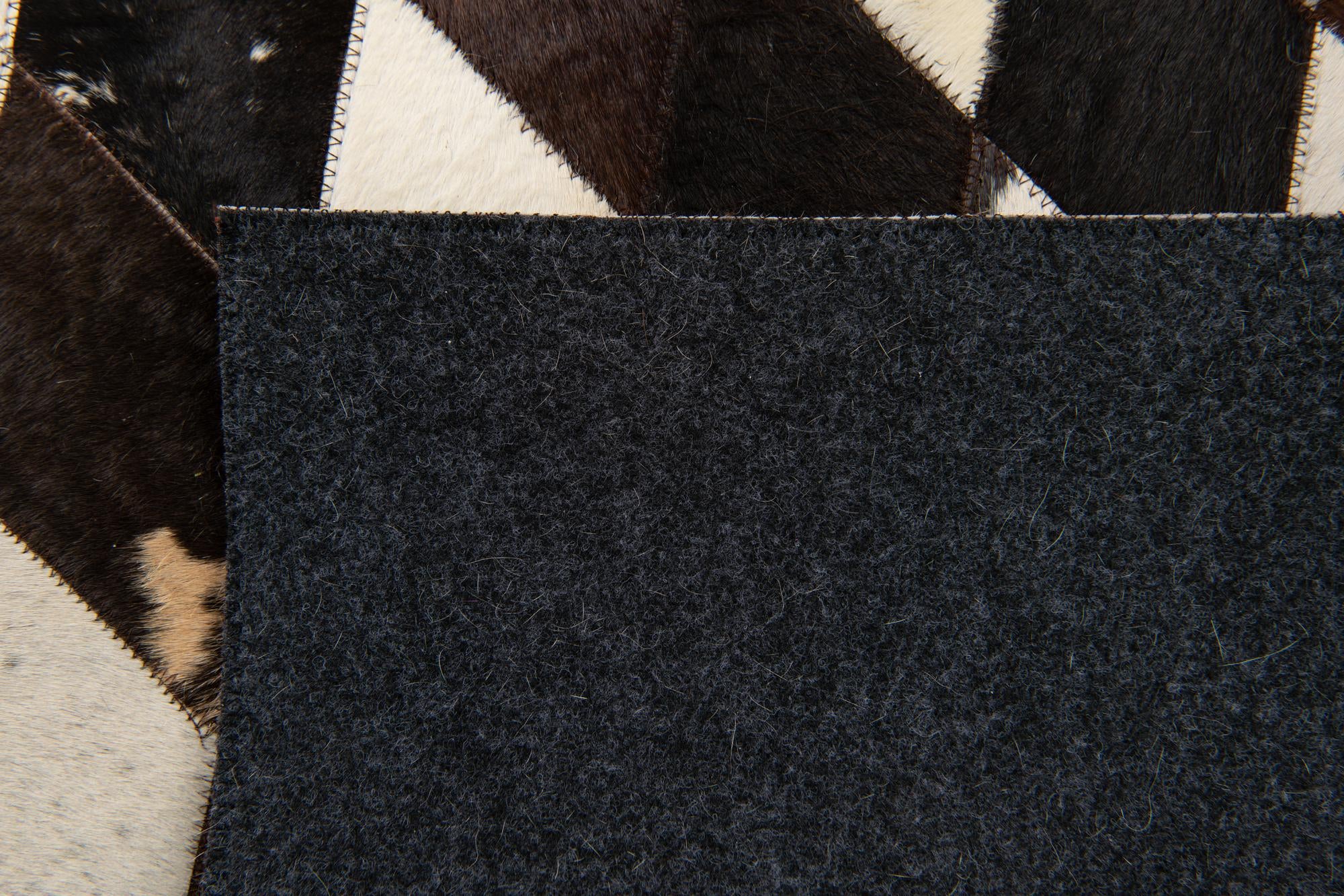 4' 1 x 5' 10 Cowhide Stocks Rug