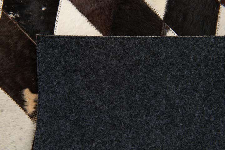 4' 1 x 5' 10 Cowhide Stocks Rug