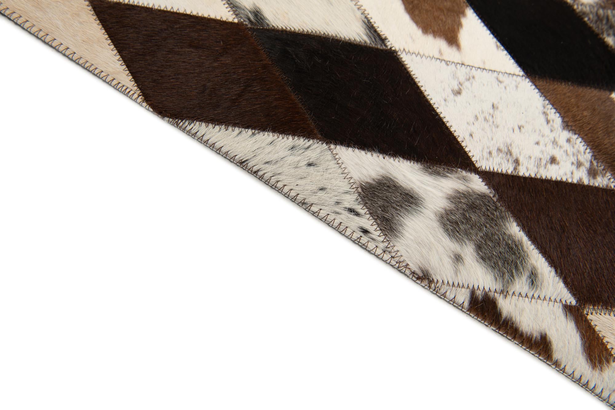 4' 1 x 5' 10 Cowhide Stocks Rug