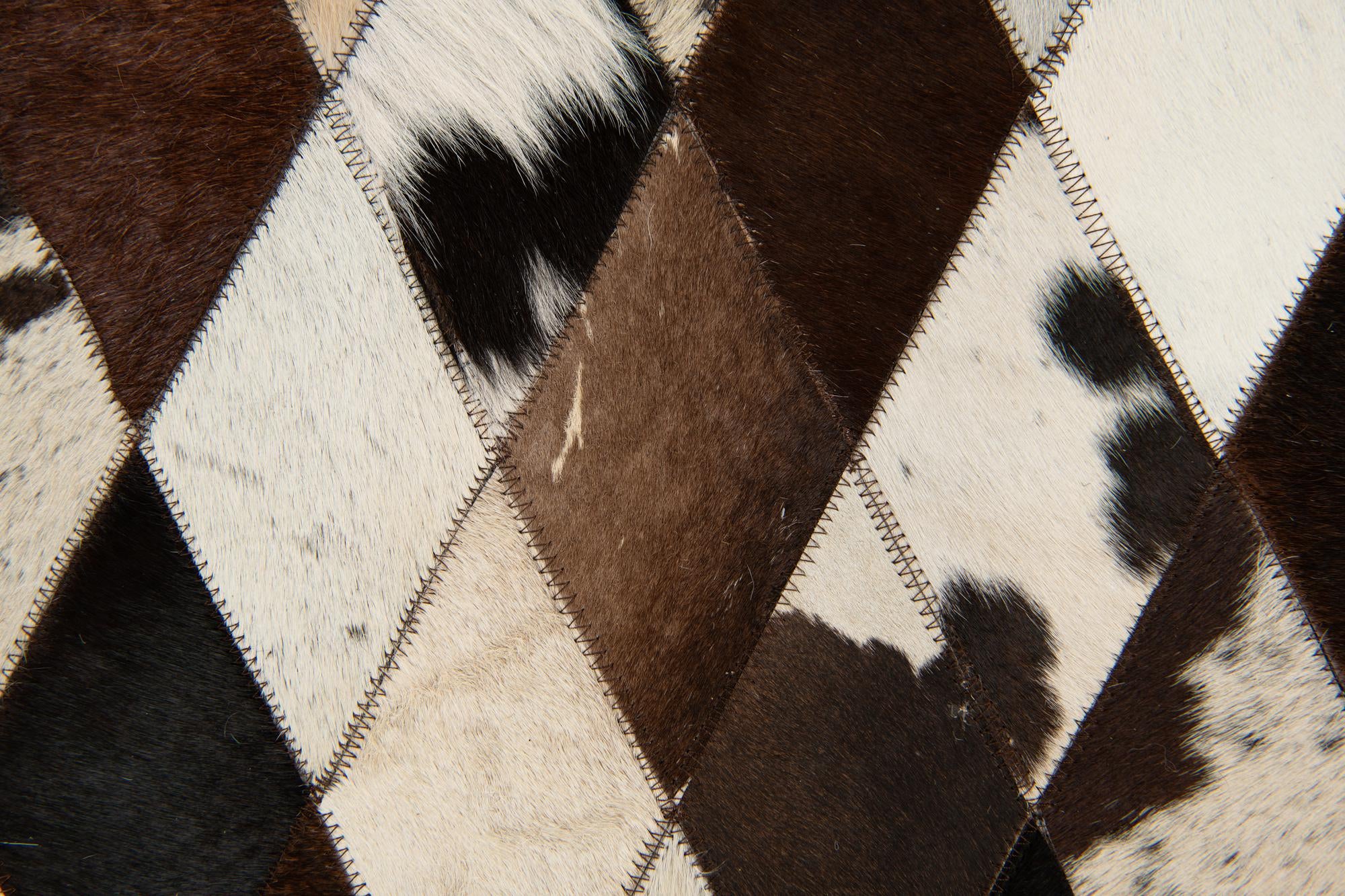 4' 1 x 5' 10 Cowhide Stocks Rug