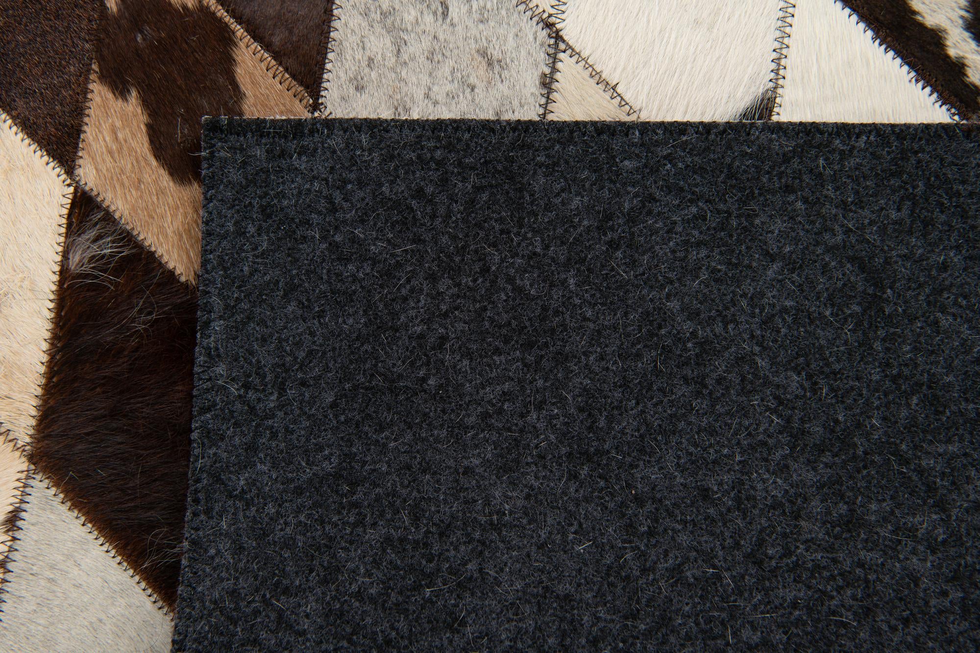 4' 1 x 5' 10 Cowhide Stocks Rug