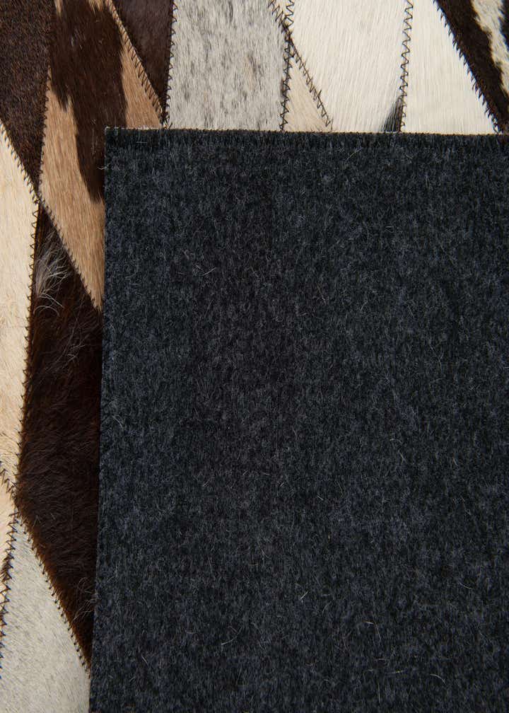 4' 1 x 5' 10 Cowhide Stocks Rug