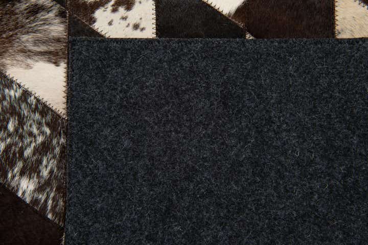 4' 1 x 5' 10 Cowhide Stocks Rug