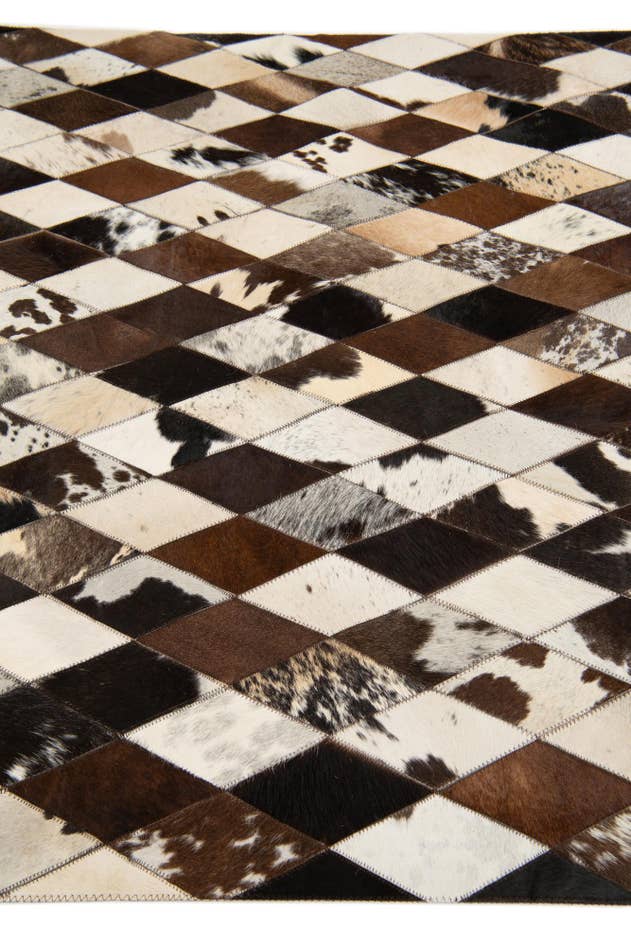 Detail image of 4' 1 x 5' 10 Cowhide Stocks Rug