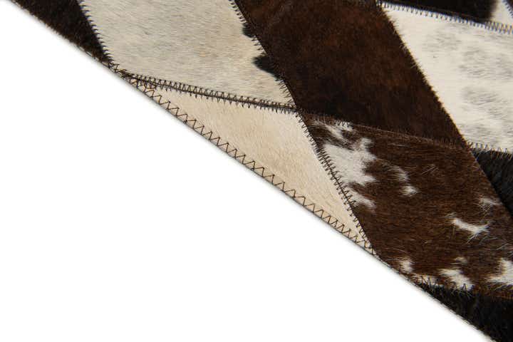 4' 1 x 5' 10 Cowhide Stocks Rug