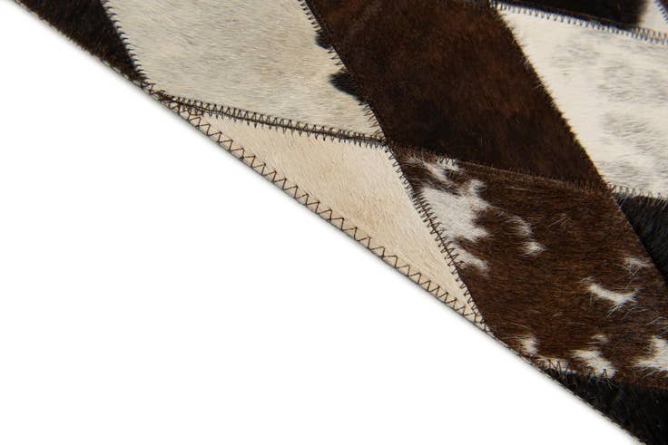 Detail image of 4' 1 x 5' 10 Cowhide Stocks Rug
