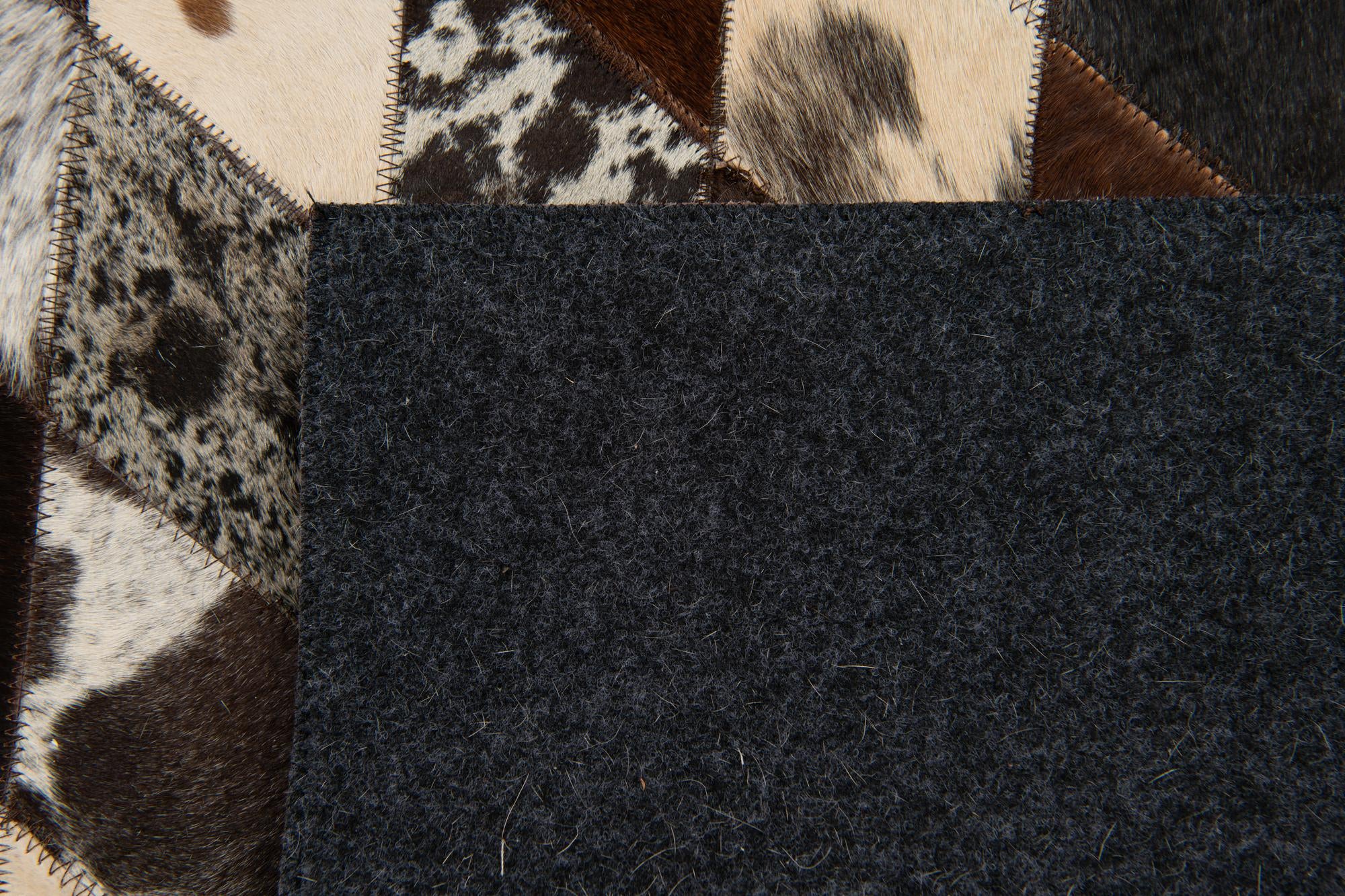 4' 1 x 5' 10 Cowhide Stocks Rug