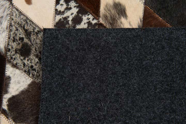 4' 1 x 5' 10 Cowhide Stocks Rug