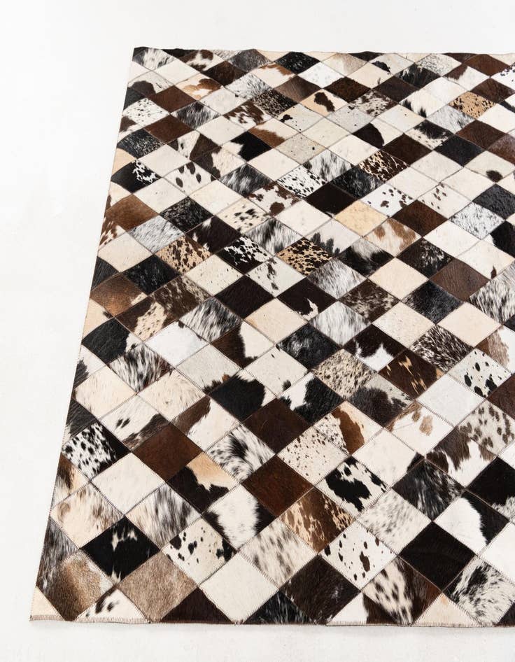 Detail image of 4' 1 x 5' 10 Cowhide Stocks Rug