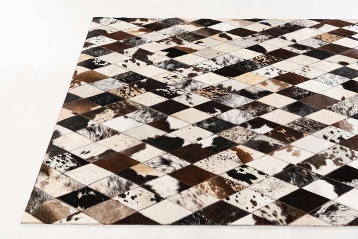 4' 1 x 5' 10 Cowhide Stocks Rug