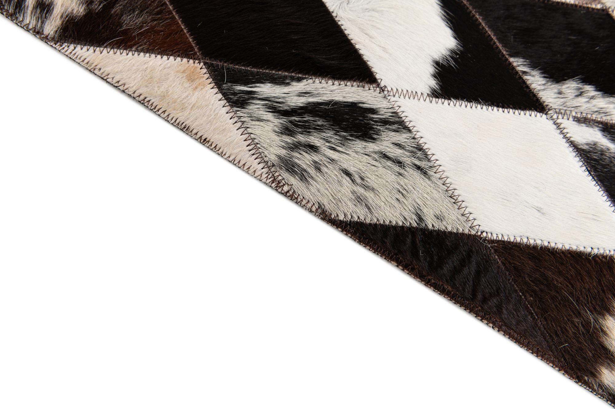 4' 1 x 5' 10 Cowhide Stocks Rug