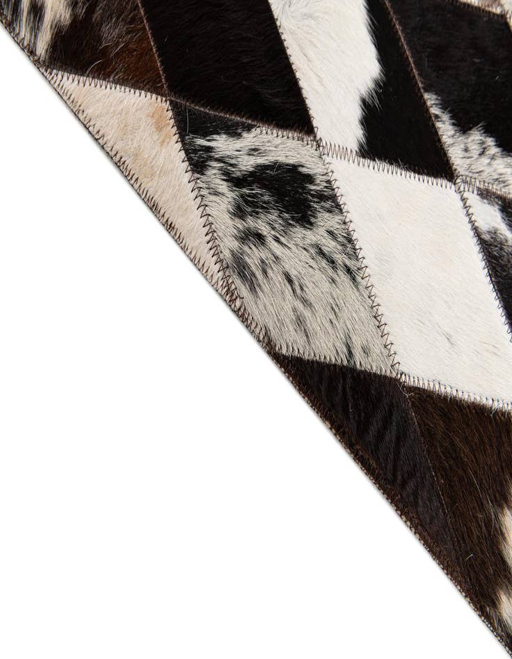 Detail image of 4' 1 x 5' 10 Cowhide Stocks Rug