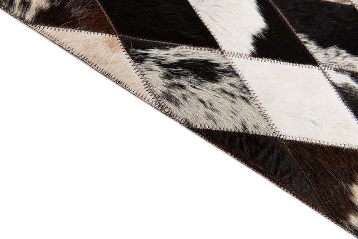 4' 1 x 5' 10 Cowhide Stocks Rug