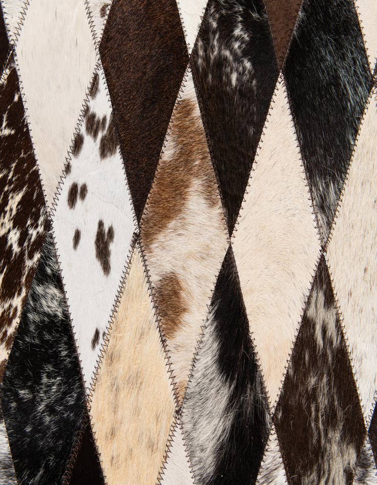 Detail image of 4' 1 x 5' 10 Cowhide Stocks Rug