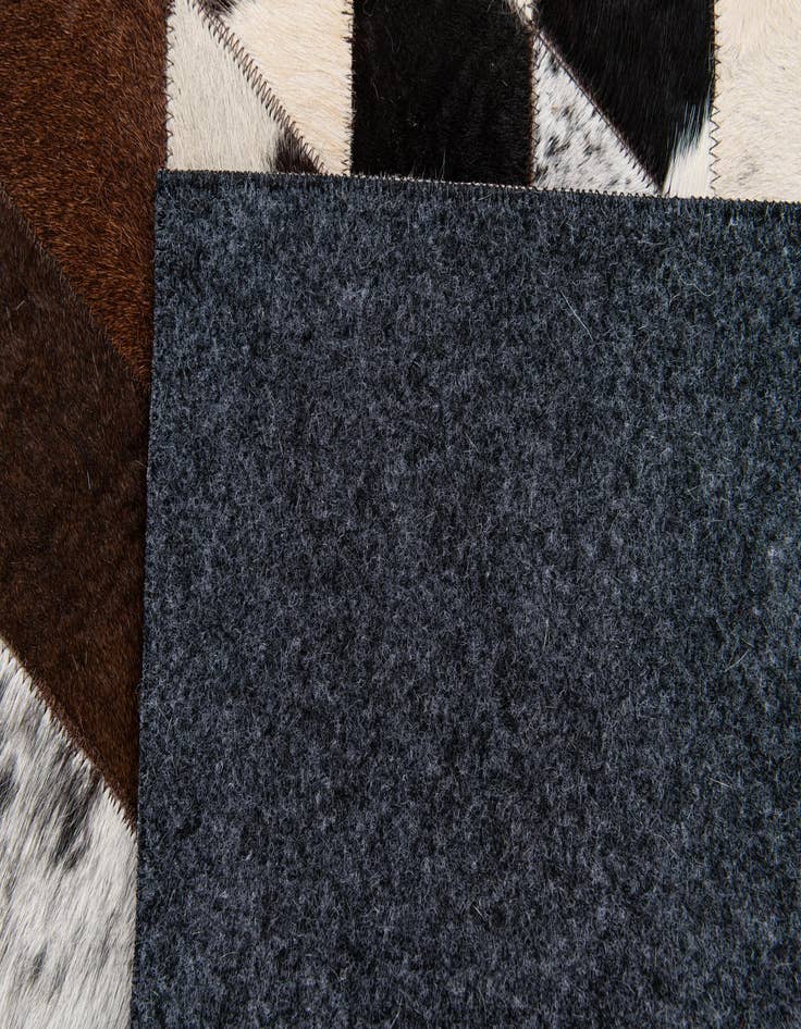 Detail image of 4' 1 x 5' 10 Cowhide Stocks Rug