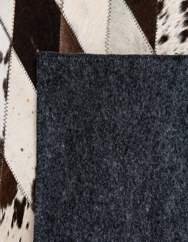 Detail image of 4' x 5' 10 Cowhide Stocks Rug