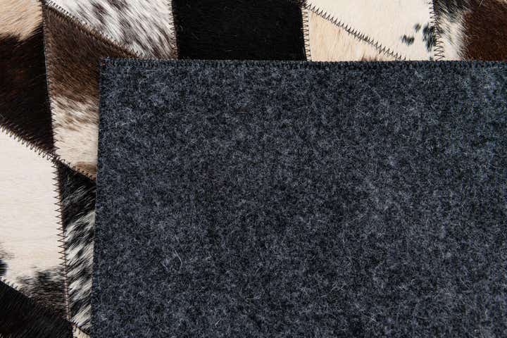 4' 1 x 5' 11 Cowhide Stocks Rug