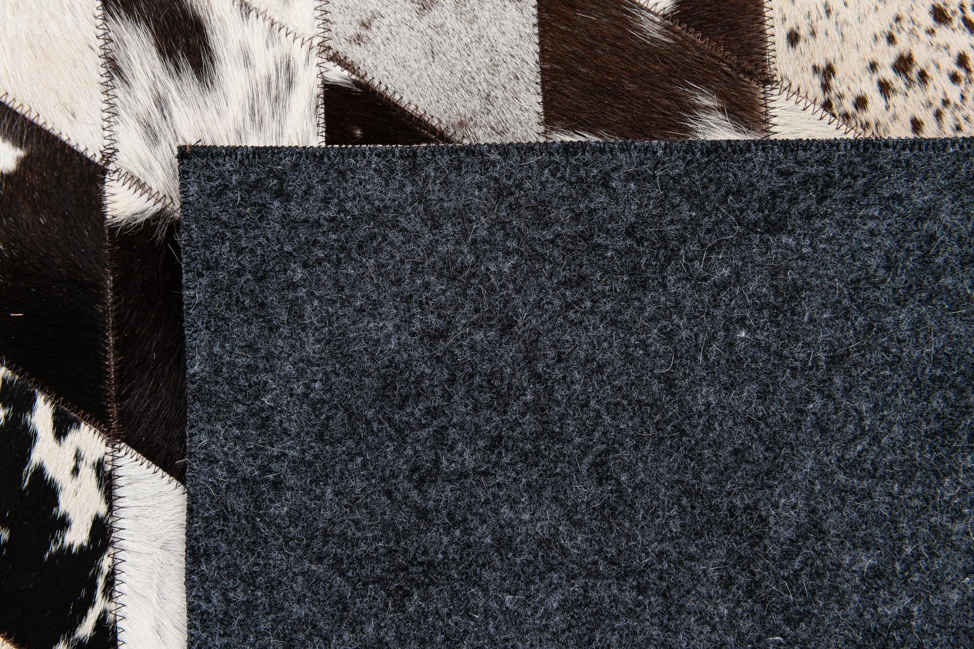 4' x 5' 11 Cowhide Stocks Rug