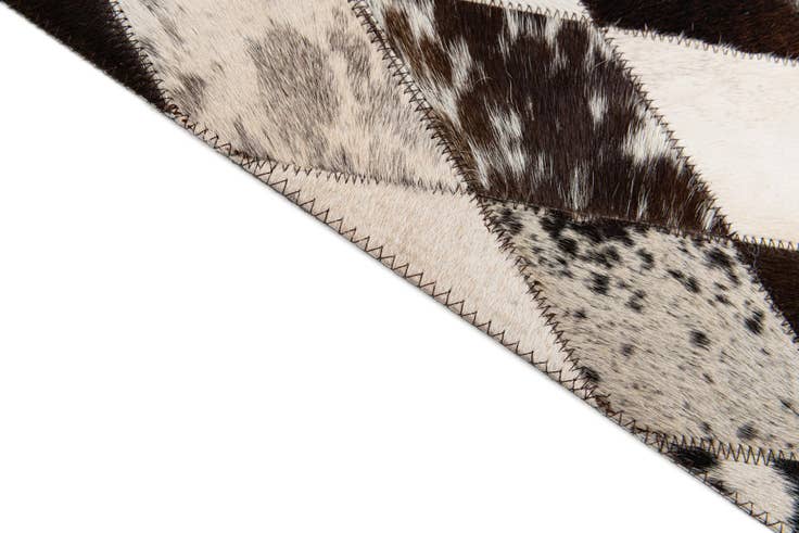 Detail image of 4' 1 x 5' 11 Cowhide Stocks Rug