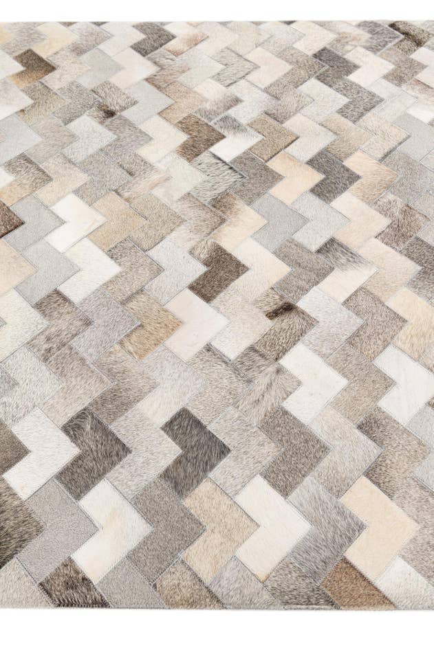 Detail image of 4' 1 x 5' 11 Cowhide Stocks Rug