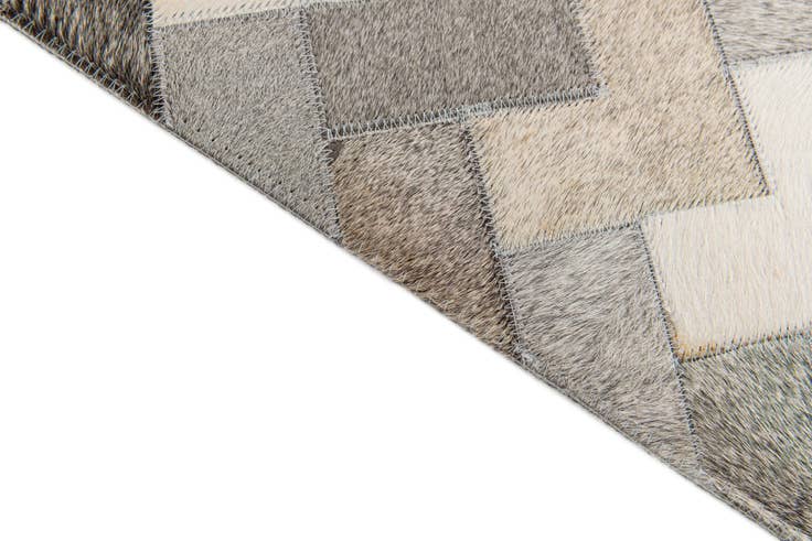 Detail image of 4' 1 x 5' 11 Cowhide Stocks Rug