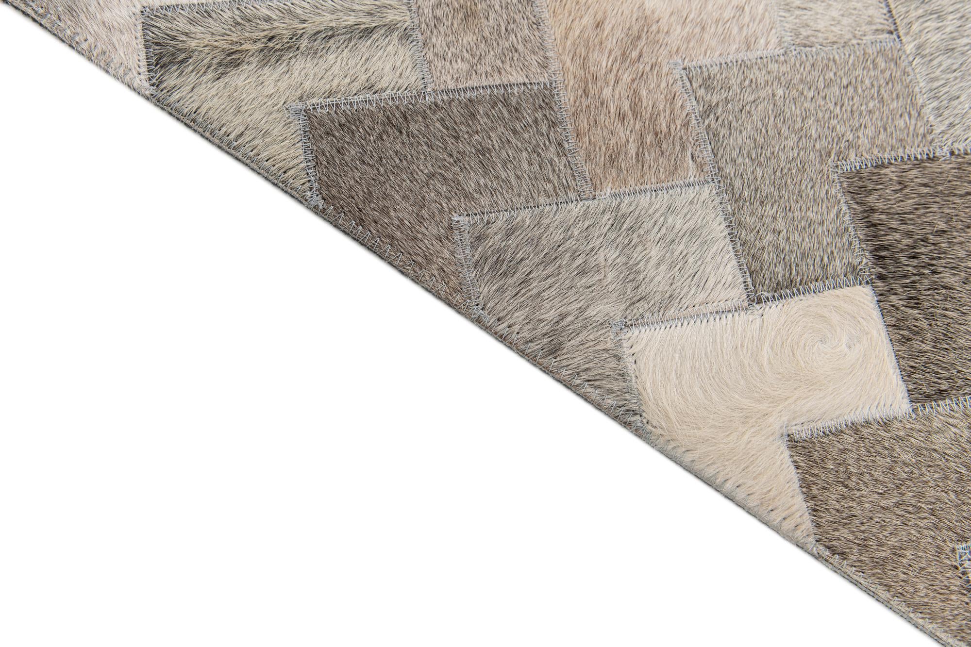 4' 1 x 5' 10 Cowhide Stocks Rug