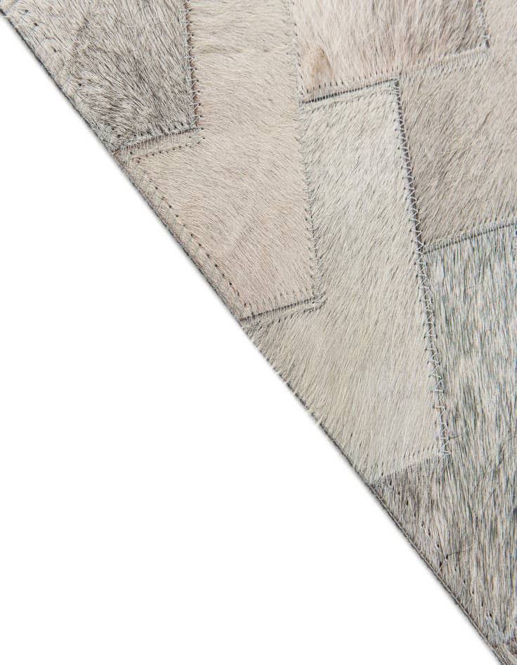 Detail image of 4' 1 x 5' 11 Cowhide Stocks Rug