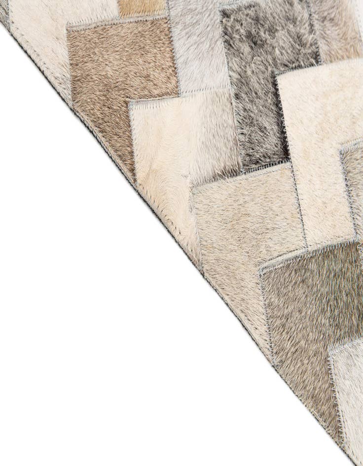 Detail image of 4' 1 x 5' 11 Cowhide Stocks Rug
