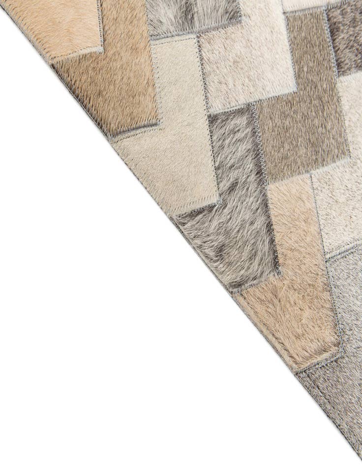 Detail image of 4' 1 x 5' 11 Cowhide Stocks Rug
