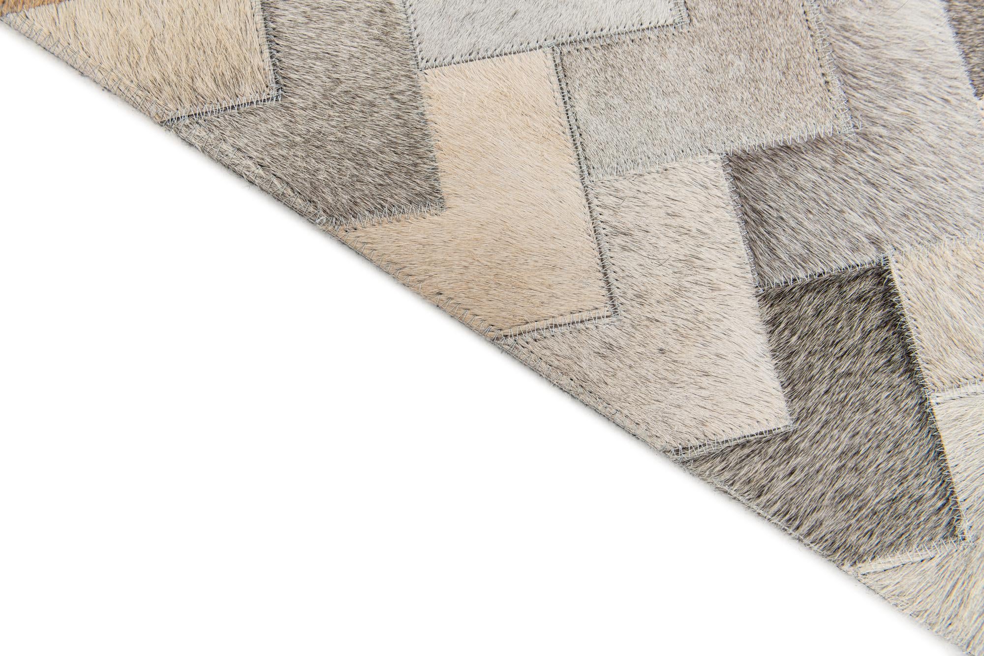 4' 1 x 5' 11 Cowhide Stocks Rug