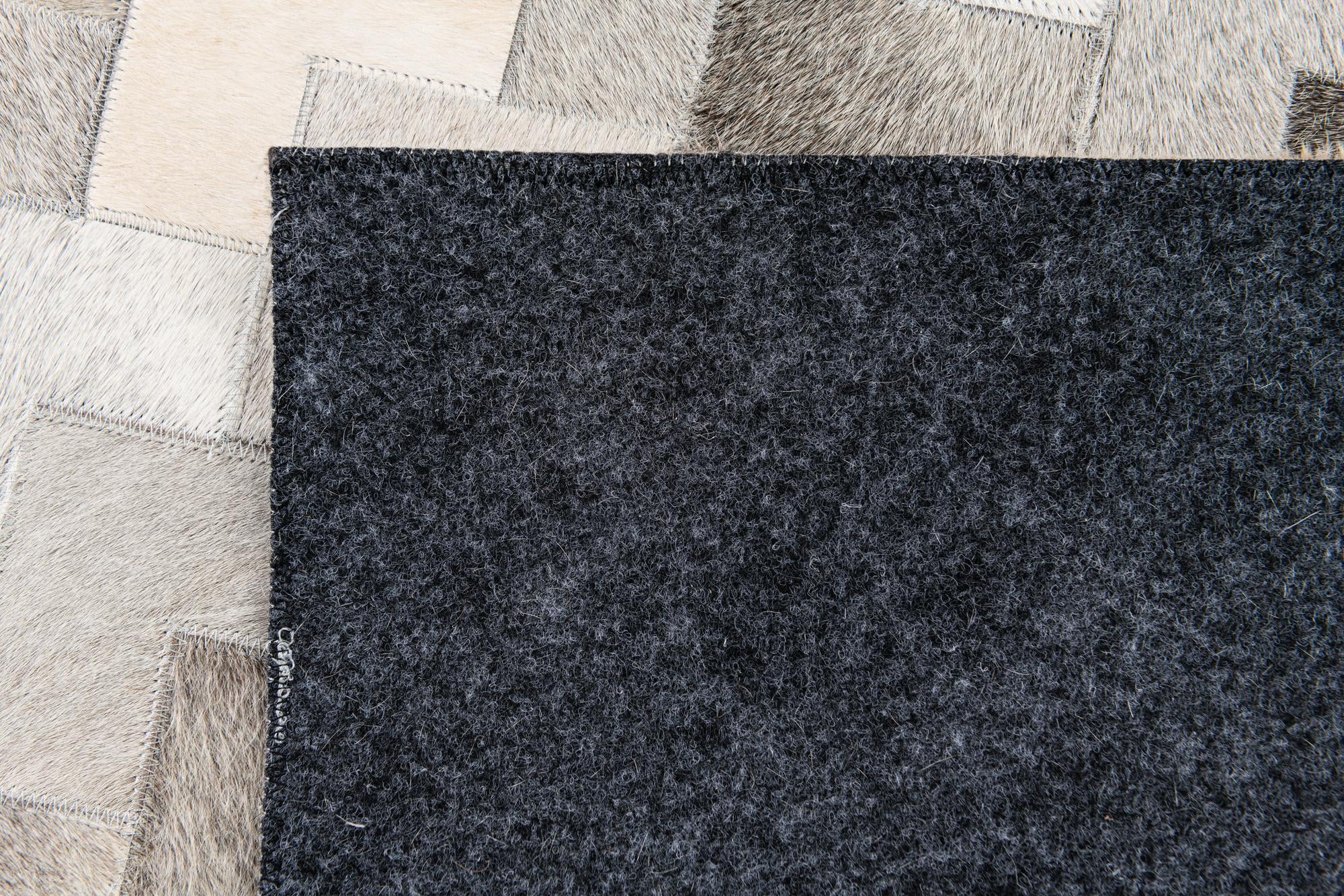 4' 1 x 5' 11 Cowhide Stocks Rug