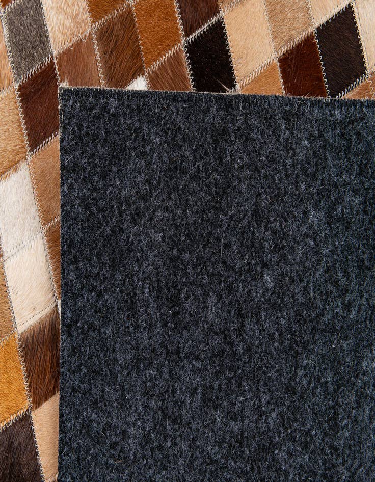 Detail image of 4' x 5' 11 Cowhide Stocks Rug