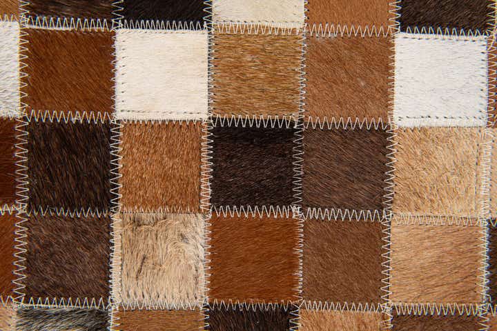 4' x 5' 11 Cowhide Stocks Rug