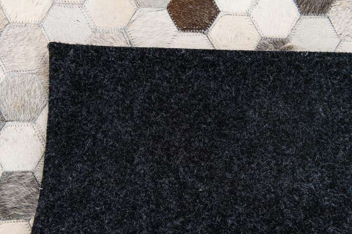 4' x 5' 11 Cowhide Stocks Rug