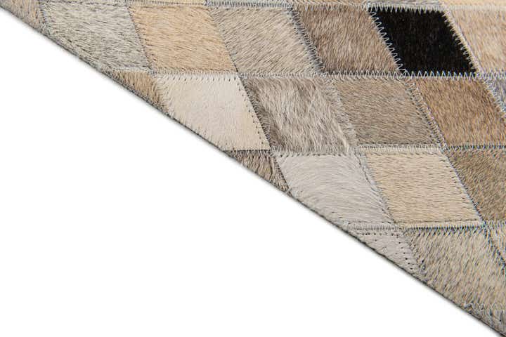 3' 11 x 6' 3 Cowhide Stocks Rug