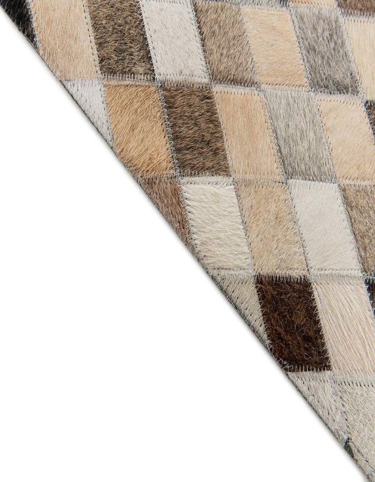 Detail image of 4' 1 x 5' 11 Cowhide Stocks Rug